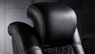 Close-up of the headrest of the Tarantino Console Suede Power Reclining Home Theater Recliner Sofa.